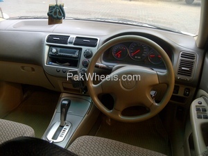 Slide_honda-civic-2004-765992