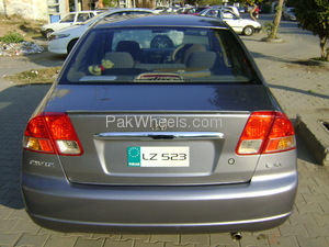 Slide_honda-civic-2004-873995