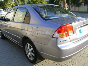 Slide_honda-civic-2004-873996
