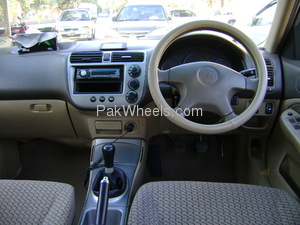 Slide_honda-civic-2004-873999