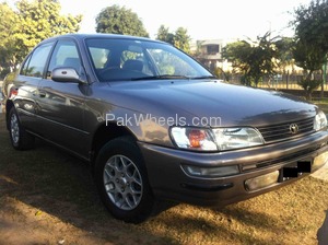 Slide_toyota-corolla-1999-890934