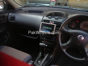Slide_nissan-ad-van-2006-897211