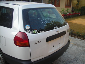 Slide_nissan-ad-van-2006-897212