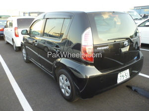 Slide_toyota-passo-2008-902215